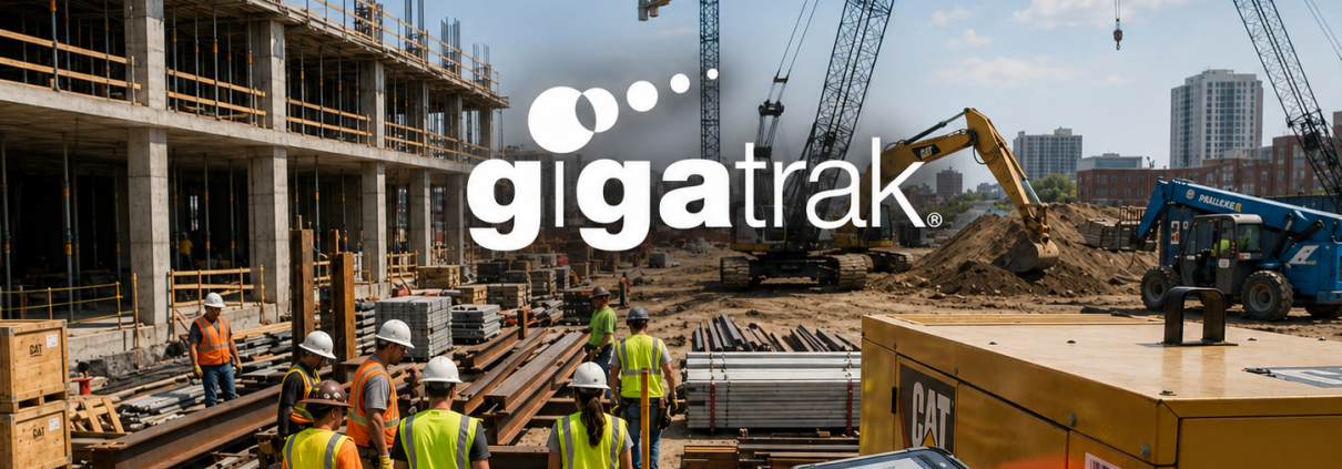 photo of happy employee using GigaTrak's asset tracking software to keep track of tools on a busy, but organized job site. GigaTrak asset tracking for contractors .
